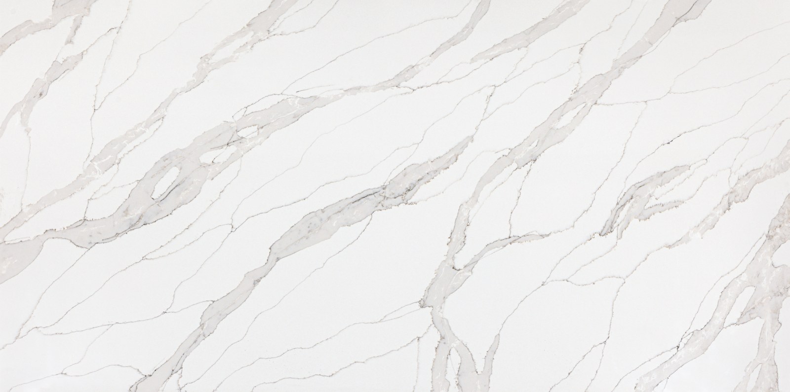 Vadara Cygnet Drift quartz, white background with light grey and brown veining
